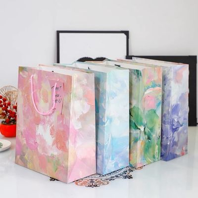 Customizable Colorful Paper Bags for Seasonal Gifts and Promotions