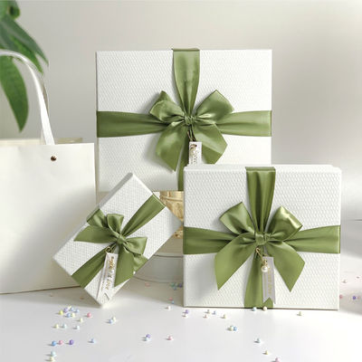 White Rigid Packaging Box With Green Bow Perfect For Jewelry Clothing Or Festive Gifts