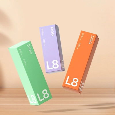 Buen precio Embalaje cosmético cuadrado Cartón de stock de planta verde Lápiz labial Brillo de labios Embalaje cartón plegable Brillo de labios líquido en línea
