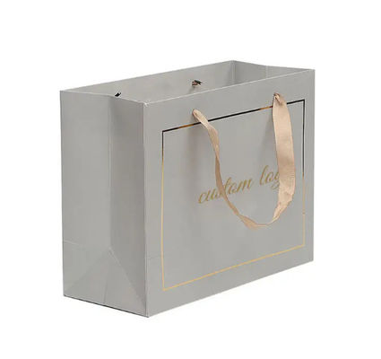 Buen precio Bolsas de compras de papel de cartón Bolsas de regalo de lujo personalizadas con mango de logotipo en línea