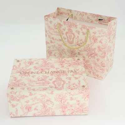 Buen precio Embalaje cosmético rosa personalizado cajas de regalo plegables de cartón Cajas plegables de imán con embalaje impreso bolsas de regalo en línea