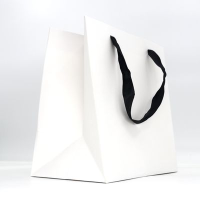 Bom preço Logotipo personalizado Lindo Saco de compras de cartão reciclado Saco de presente para roupas Artesanato Aniversário ou uso de presente on-line