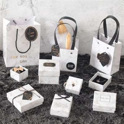 Buen precio Caja de embalaje de joyas de mármol Anillo de orejas Brazalete Caja de embalaje en línea
