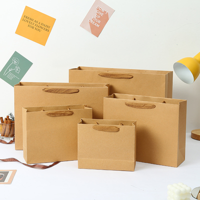 Guter Preis Kraftpapier-Verpackungsbeutel Weihnachtsgeschenktüte Partygeschenk Hand-Tragetasche Verpackungsbeutel für Take-away Online