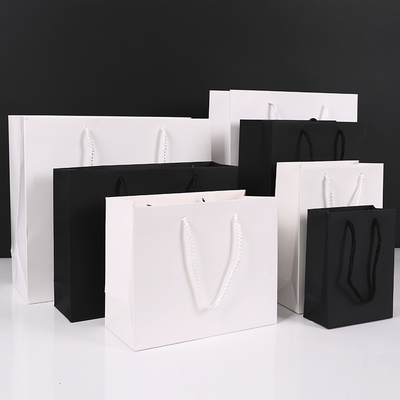 Good price Premium Kraft Paper Gift Bags Thickened Clothing Shopping Bags With Rope Handles online