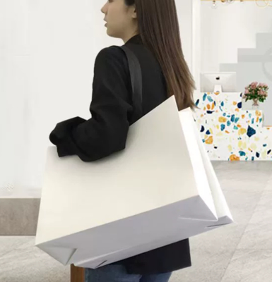 Custom Printed White Kraft Paper Bags with Rope Handles for Boutiques